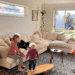 surf parents and kids enjoying balance board at home