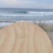 Wooden Surf Balance Board at the beach and how it helps you surf better