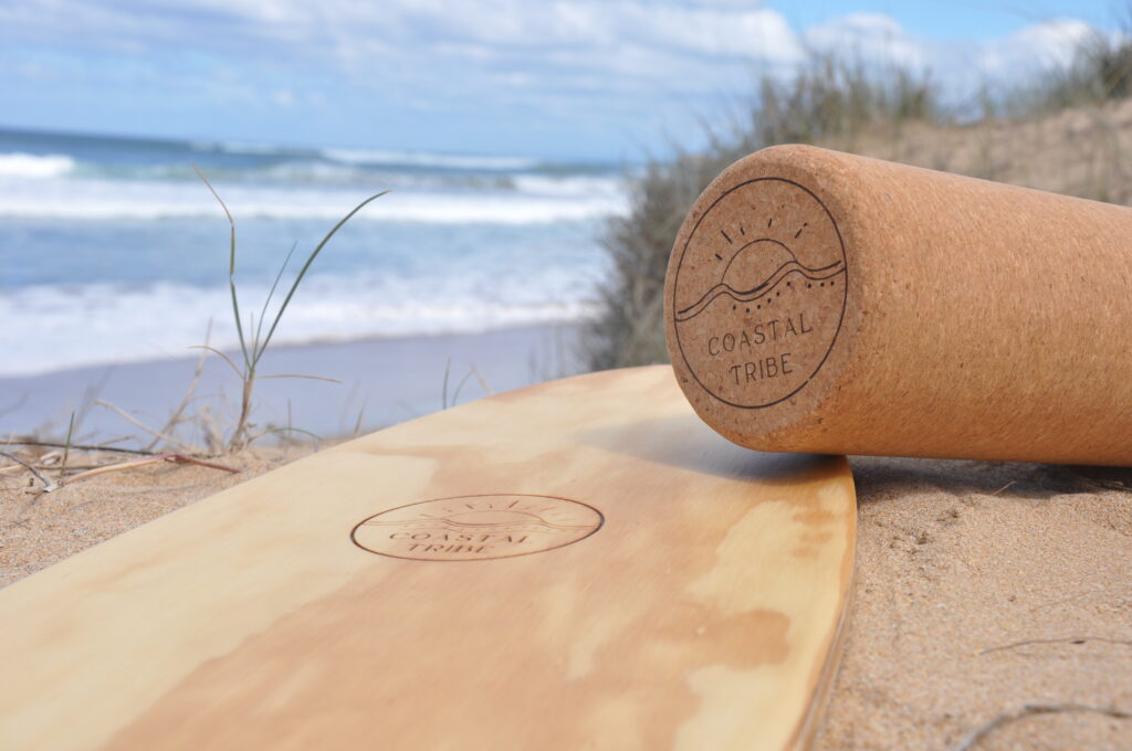 Coastal Tribe surf balance board in the dunes