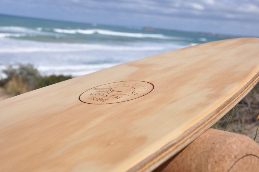 Coastal Tribe surf balance board in the dunes at the beach