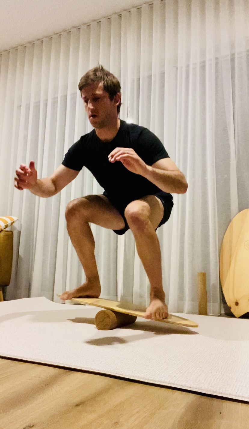 Wooden Surf Balance Board at home for working out
