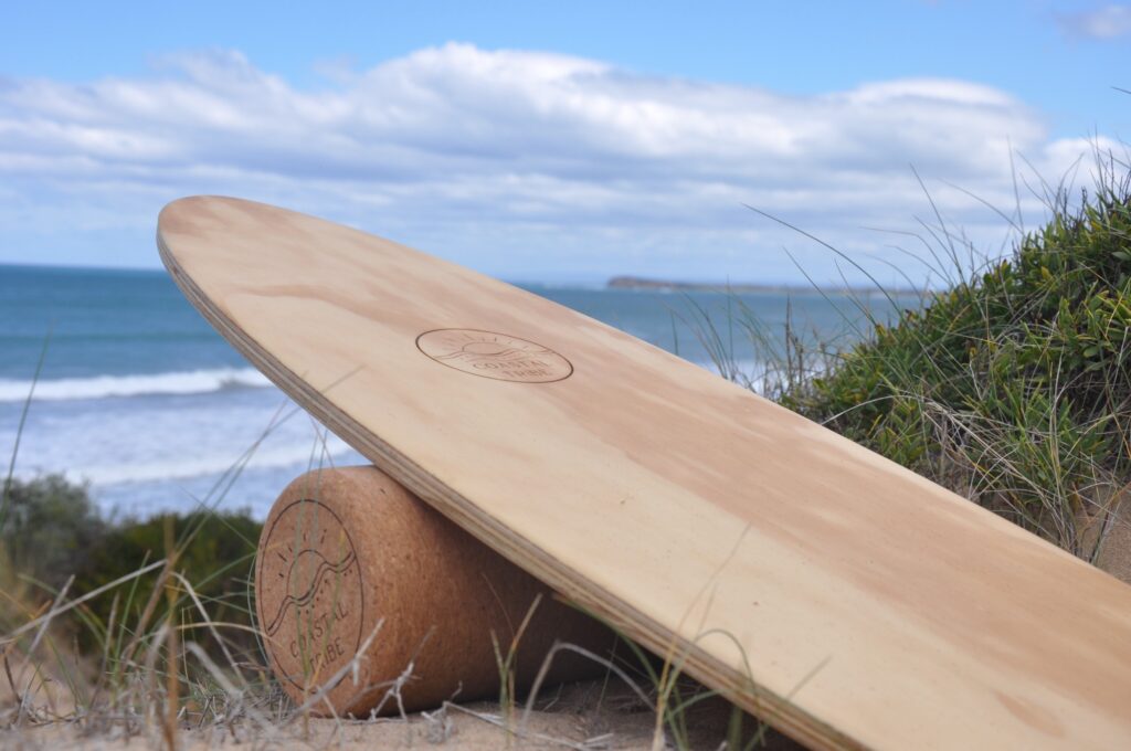 wooden surf balance board on cork roller